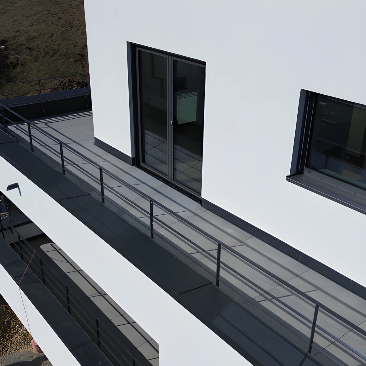 Drainage channel UD Pro black lifestyle image on balcony
