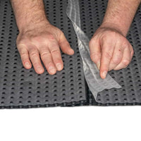 DURAL Drainagematte DR100++ mit runden Noppen und Vlies wird überlappend verlegt